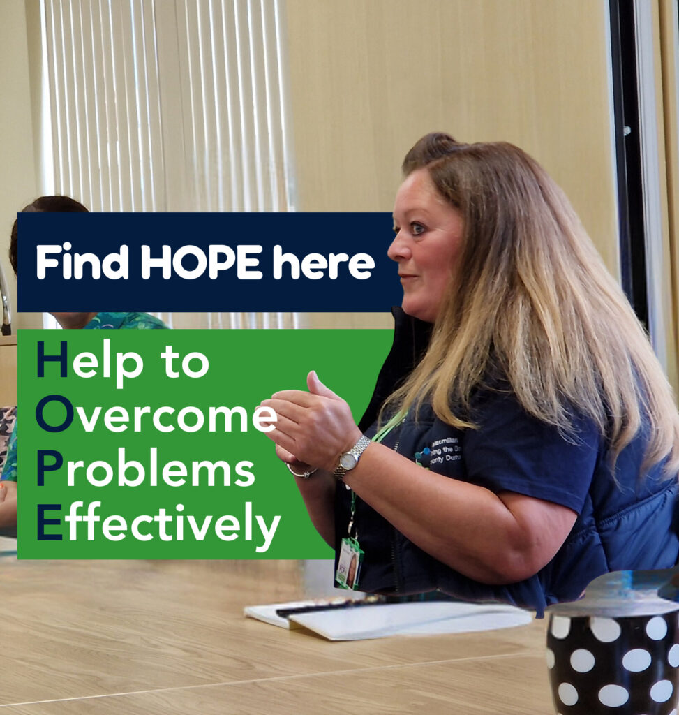 A member of the Joining the Dots team is sat at a desk on the right of the image. Text is displayed on boxes next to her. Find HOPE here. Help to Overcome Problems Effectively The initials of the four words spell HOPE